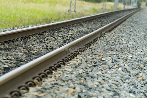 Rail track close up.  shot at track level. - Mining Photo Stock Library