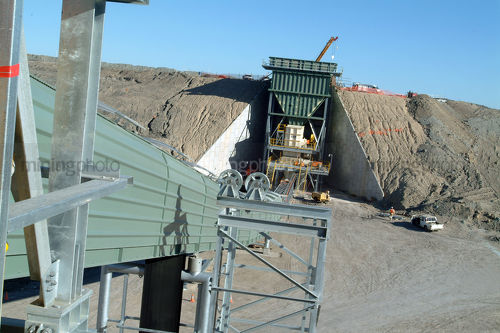 Hopper and conveyor being constructed - Mining Photo Stock Library