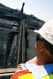 Mining Photo Stock Library - project manager overseeing coal conveyor ( Weight: 3  New Image: NO)