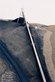 Mining Photo Stock Library - underground conveyor emptying coal to outside stockpile vertical image ( Weight: 3  New Image: NO)