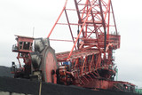 Mining Photo Stock Library - closeup side on of coal reclaimer working horizontal image ( Weight: 1  New Image: NO)