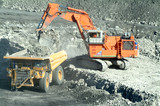 Mining Photo Stock Library - digger loading a haul truck with overburden on opencut mine floor. ( Weight: 1  New Image: NO)