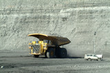 Mining Photo Stock Library - coal haul truck driving along opencut mine site with light vehicle and high walls behind ( Weight: 3  New Image: NO)