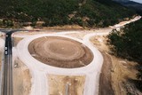 Mining Photo Stock Library - cars detouring around the constructing of a roundabout on a highway ( Weight: 4  New Image: NO)