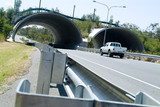 Mining Photo Stock Library - light vehicle car driving on road through bebo archway bridge. guide rails and established koala crossing adjacent ( Weight: 2  New Image: NO)