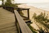 Mining Photo Stock Library - timber boardwalk bridge adjacent to patrolled Queensland beach ( Weight: 2  New Image: NO)