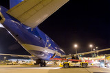 Mining Photo Stock Library - cargo plane being loaded with freight by conveyor at night ( Weight: 3  New Image: NO)