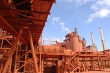 Mining Photo Stock Library - red conveyors and storage towers inside a refinery ( Weight: 1  New Image: NO)