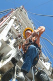 Mining Photo Stock Library - drill rig worker up the derrick installing equipment ( Weight: 1  New Image: NO)