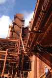 Mining Photo Stock Library - worker in full PPE walking down stairs at a refinery ( Weight: 1  New Image: NO)