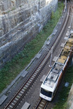 Mining Photo Stock Library - light rail train coming from a tunnel  next to steep high rock walls.  shot from above ( Weight: 1  New Image: NO)