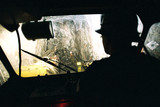 Mining Photo Stock Library - Silhouette of mine worker underground looking out machinery windscreen ( Weight: 1  New Image: NO)