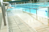Mining Photo Stock Library - handicapped disabled access ramp into public swimming pool ( Weight: 5  New Image: NO)