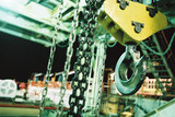 Mining Photo Stock Library - large hook and chains hanging on the derrick on a drill rig site ( Weight: 5  New Image: NO)