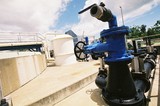 Mining Photo Stock Library - water pump and concrete holding tanks at water treatment plant. ( Weight: 2  New Image: NO)