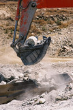 Mining Photo Stock Library - excavator bucket loading hard metal into the back of a haul truck in open cut mine site.  shot up close. ( Weight: 2  New Image: NO)
