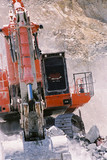 Mining Photo Stock Library - excavator shot straight on loading  in open cut mine site environment. ( Weight: 4  New Image: NO)