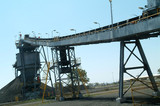 Mining Photo Stock Library - high covered enclosed conveyor leading up to stockpile hopper. ( Weight: 4  New Image: NO)