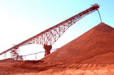 Mining Photo Stock Library - great shot of large conveyor stockpiling red dirt product. ( Weight: 1  New Image: NO)