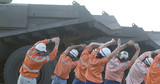 Mining Photo Stock Library - truck drivers in PPE doing morning stretching together before shift.   ( Weight: 3  New Image: NO)