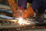 Mining Photo Stock Library - close up of workers gloved hands using a welder ( Weight: 4  New Image: NO)