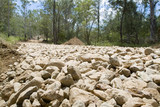 Mining Photo Stock Library - rocks form road base on forestry road.  shot at ground level to accentuate the diameter of the stones. ( Weight: 2  New Image: NO)