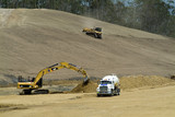 Mining Photo Stock Library - excavator, bulldozer and water cart working on a highway construction site. ( Weight: 3  New Image: NO)