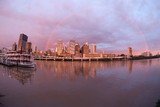 Mining Photo Stock Library - sunset rainbow brisbane building skyline after a storm with paddle steamer boat on the river in foreground at wharf ( Weight: 5  New Image: NO)