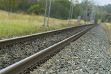 Mining Photo Stock Library - close up of heavy rail track disappearing into out of focus distance. ( Weight: 5  New Image: NO)