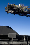 Mining Photo Stock Library - close up of coal reclaimer head above conveyor with stockpile in background. ( Weight: 4  New Image: NO)