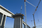 Mining Photo Stock Library - bridge construction with many cranes and pre cast concrete pylons. ( Weight: 2  New Image: NO)