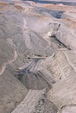 Mining Photo Stock Library - open cut coal mine with huge dragline working on teh overburden. high walls and coal seam in background. aerial shot. ( Weight: 3  New Image: NO)