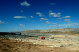 Mining Photo Stock Library - filling blasting holes at open cut coal mine.  coal seam, high walls and overburden stockpiles in background. ( Weight: 1  New Image: NO)