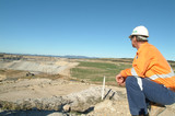 Mining Photo Stock Library - mine manager inspecting open cut coal mine revegetation from a distance ( Weight: 2  New Image: NO)