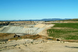 Mining Photo Stock Library - Revegetation of open cut coal mine with coal haul road in the middle.  lots of green planting shot wide. ( Weight: 3  New Image: NO)