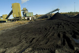 Mining Photo Stock Library - coal wash plant with loader tracks in stockpile.  good generic shot with room for text in foreground. ( Weight: 3  New Image: NO)