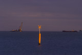Mining Photo Stock Library - pylon signal in shipping lane with barge, dredgre and ships in the background ( Weight: 2  New Image: NO)