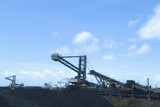 Mining Photo Stock Library - coal reclaimers and stackers working stockpiles at coal terminal.  lots of stockpiling, conveyors adn heavy machinery. ( Weight: 1  New Image: NO)
