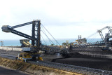 Mining Photo Stock Library - close up of coal reclaimer working at shipping terminal.   ( Weight: 4  New Image: NO)