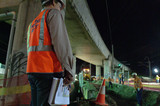 Mining Photo Stock Library - project manager engineer overseeing  infrastructure project.  night works. ( Weight: 1  New Image: NO)