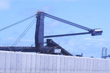 Mining Photo Stock Library - close up of a reclaimer at coal terminal with pre cast bunding in foreground. ( Weight: 1  New Image: NO)