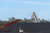 Mining Photo Stock Library - stockpiled coal with lighting tower  and conveyor in foreground. ( Weight: 4  New Image: NO)