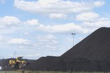 Mining Photo Stock Library - wheeled loader stockpiling coal at rail terminal ( Weight: 3  New Image: NO)