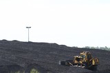 Mining Photo Stock Library - close up of bulldozer stockpiling coal. ( Weight: 3  New Image: NO)