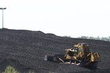 Mining Photo Stock Library - close up of bulldozer stockpiling coal. ( Weight: 3  New Image: NO)