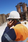 Mining Photo Stock Library - mine worker using radio.  vertical image. ( Weight: 3  New Image: NO)