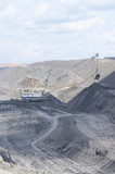 Mining Photo Stock Library - dragline shifting overburden in open cut coal mine. blasting drill holes in foreground.  vertical image. ( Weight: 3  New Image: NO)