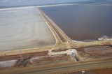 Mining Photo Stock Library - aerial shot of large salt lakes, some still with water.  rail line in foreground ( Weight: 1  New Image: NO)