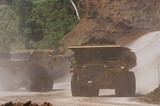 Mining Photo Stock Library - two haul trucks pass on a haul road in an open cut coal mine. ( Weight: 1  New Image: NO)
