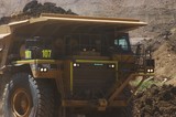 Mining Photo Stock Library - loaded haul truck in open cut mine hauling overburden to stockpile.  green LED lights on front. ( Weight: 1  New Image: NO)